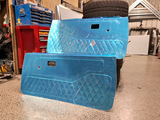 Aluminium doorcards with stitch-look and blue protective film