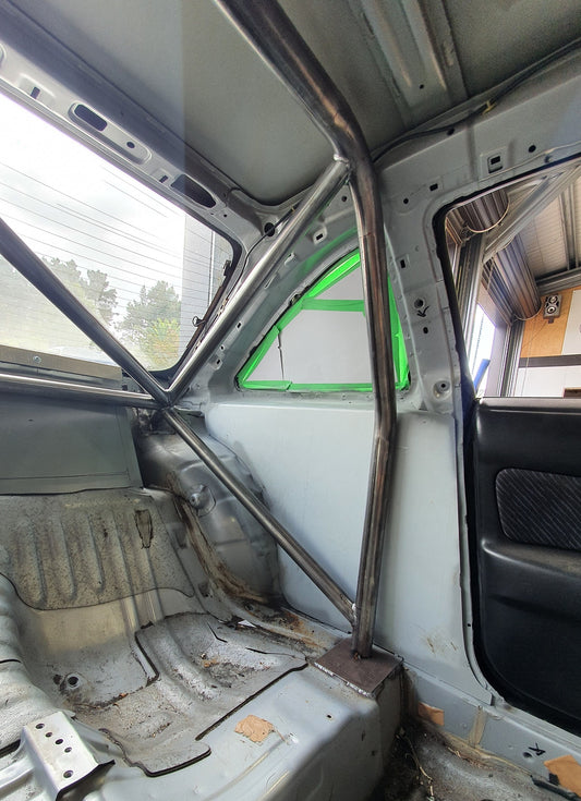 Interior of stripped out drift car with custom metal interior pieces fitted
