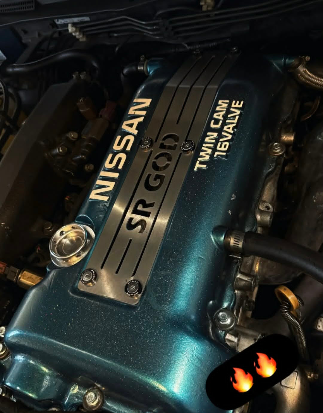 Custom coil cover designed to match personalised plate installed on engine